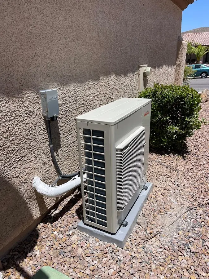 Residential air conditioning condenser unit in Woodburn